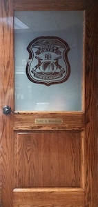 Custom red oak door with custom laser glass etching